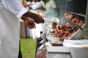 Chef grilling at a catering event