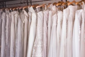 Spring 2021 wedding dresses hanging in shop