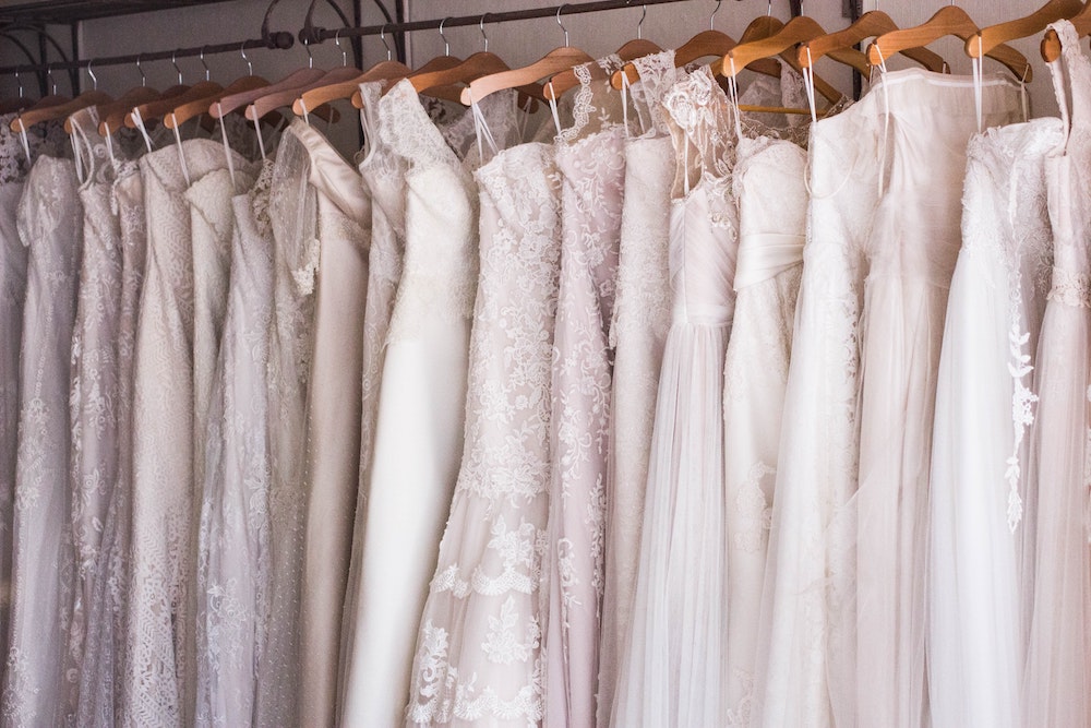 Spring 2021 wedding dresses hanging in shop
