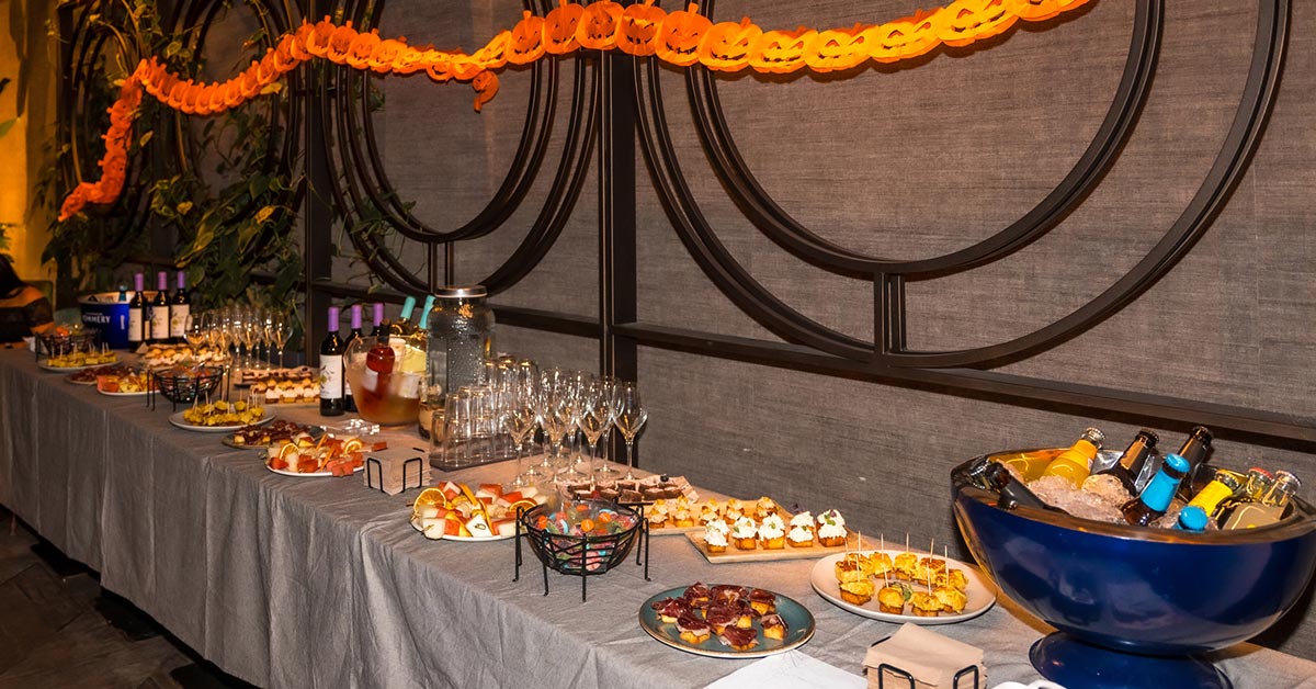 Halloween party catering table with food